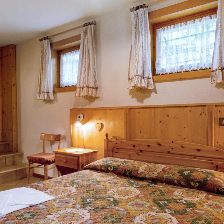 Appartamenti Marmolada Falcade - Appartamento Deluxe con 2 Camere da Letto e Vista Giardino - 11