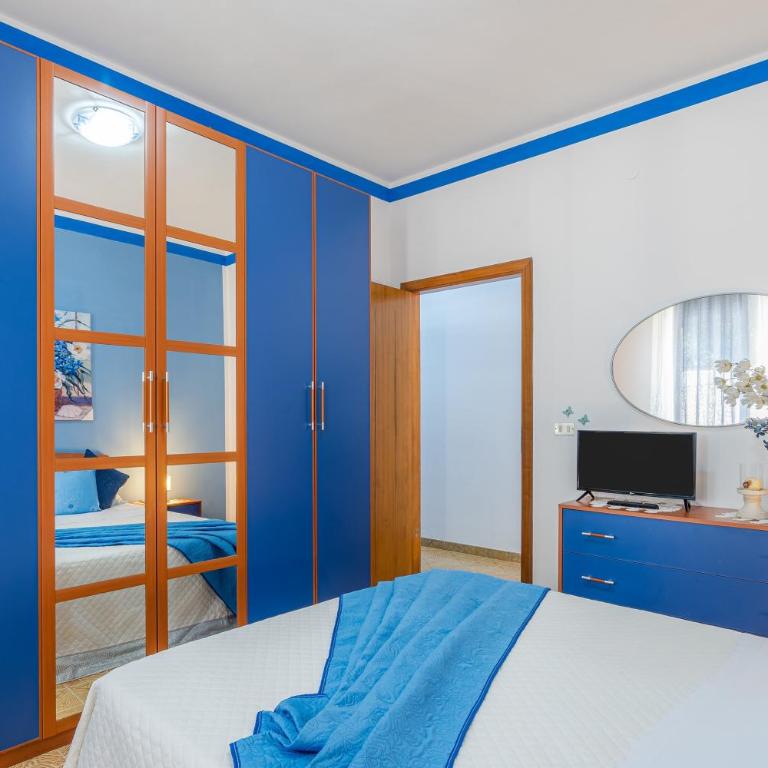 Villa le tre Commari - Blu - Appartamento Deluxe con 2 Camere da Letto e Vista Giardino - 10