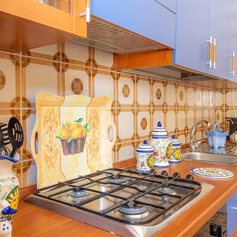 Villa le tre Commari - Blu - Appartamento Deluxe con 2 Camere da Letto e Vista Giardino - 7