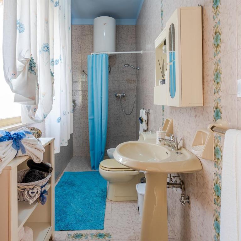 Villa le tre Commari - Blu - Appartamento Deluxe con 2 Camere da Letto e Vista Giardino - 16