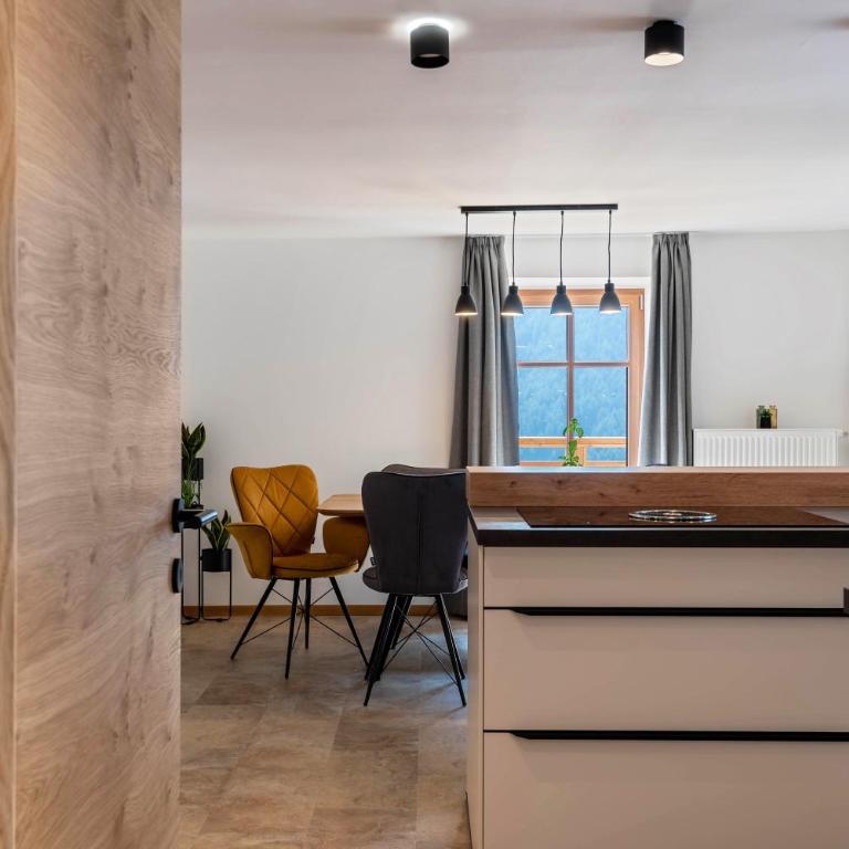 Sparberhof Apt Floriani - Deluxe-Apartment mit 2 Schlafzimmern und Gartenblick - 13