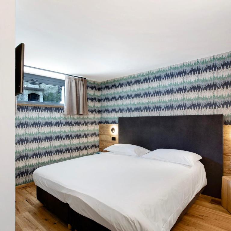 Valgrisa Mountain Lodges 3 - Appartamento Deluxe con 2 Camere da Letto e Vista Giardino - 10