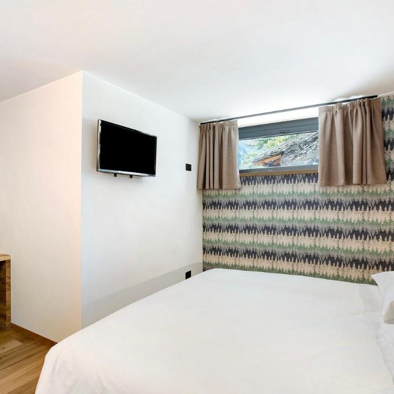 Valgrisa Mountain Lodges 3 - Appartamento Deluxe con 2 Camere da Letto e Vista Giardino - 14