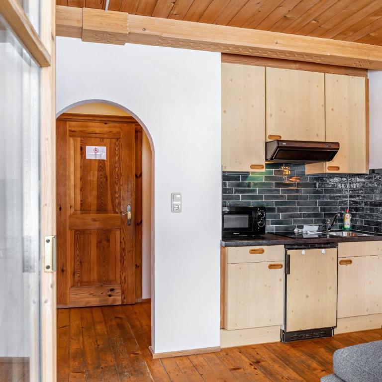 Schwüwong Sportapartments 21 - Apartment mit 1 Schlafzimmer und Gartenblick - 11