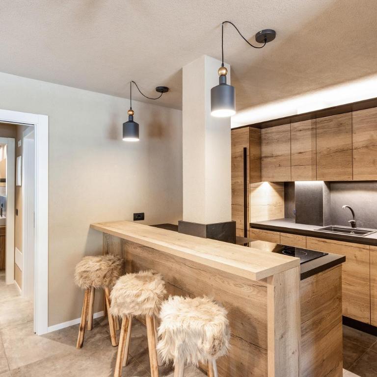 Appartamento Nido - Appartamento Deluxe con 2 Camere da Letto e Vista Giardino - 9
