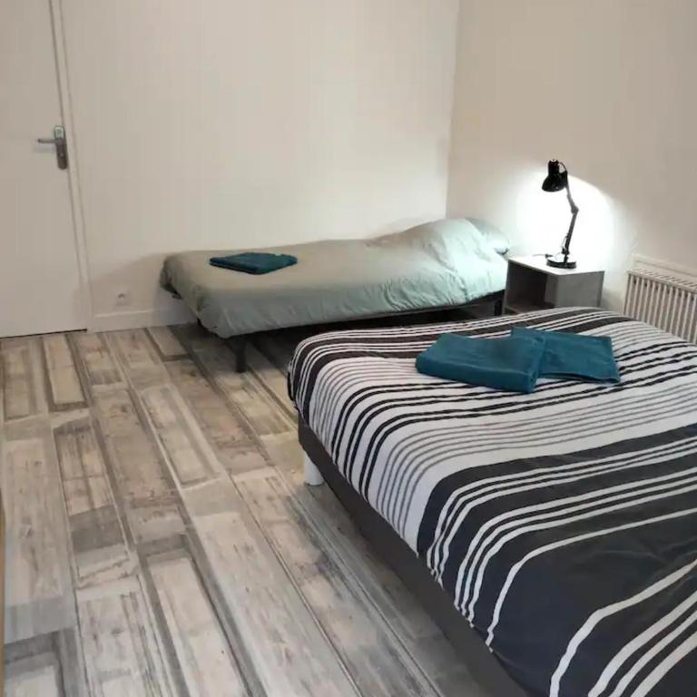 Chez Gaston - Two-Bedroom Deluxe Apartment with Garden View - 10