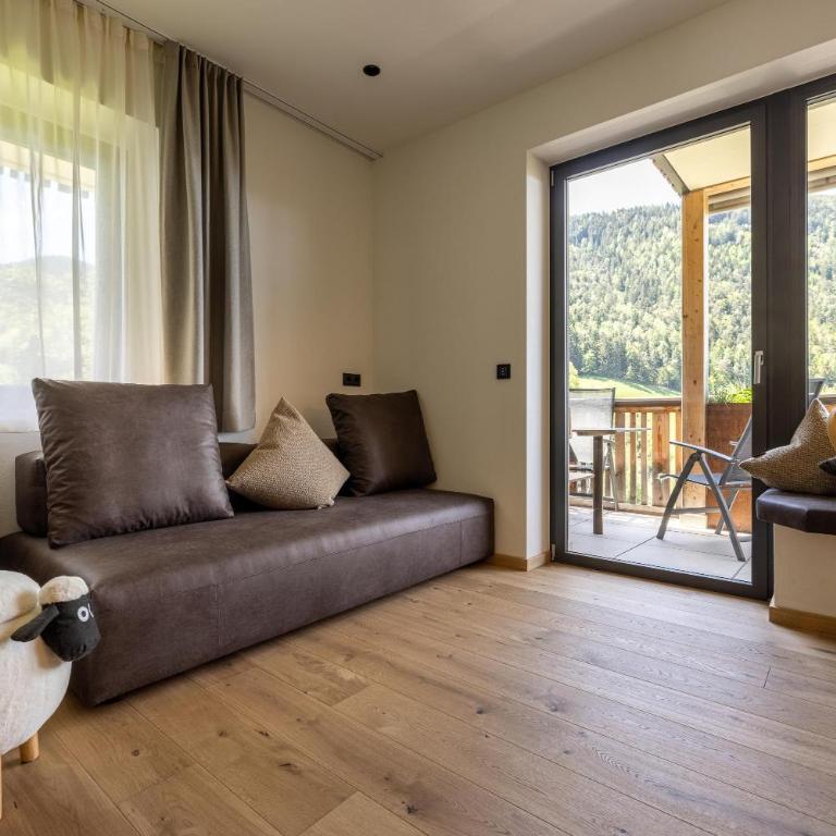Sonnleiten Sonnenalm - Two-Bedroom Deluxe Apartment with Garden View - 1