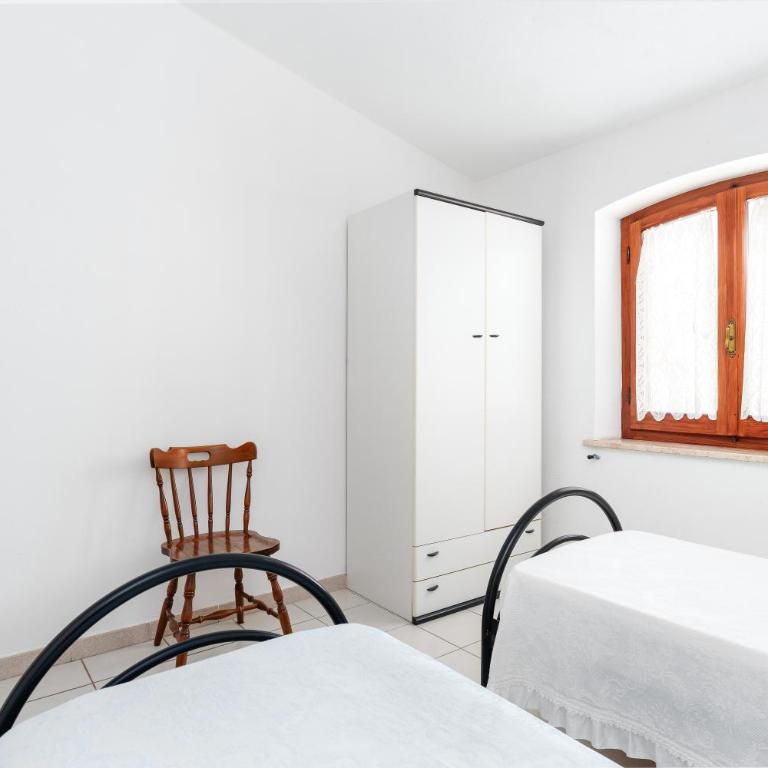 Appartamento in villa 5 posti letto - Appartamento Deluxe con 2 Camere da Letto e Vista Giardino - 17