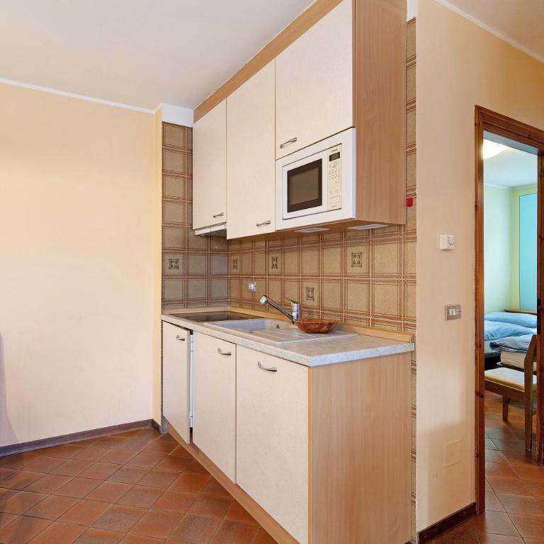 Chalet Meridiana Appartamento 8 - Appartamento Deluxe con 2 Camere da Letto e Balcone - 17