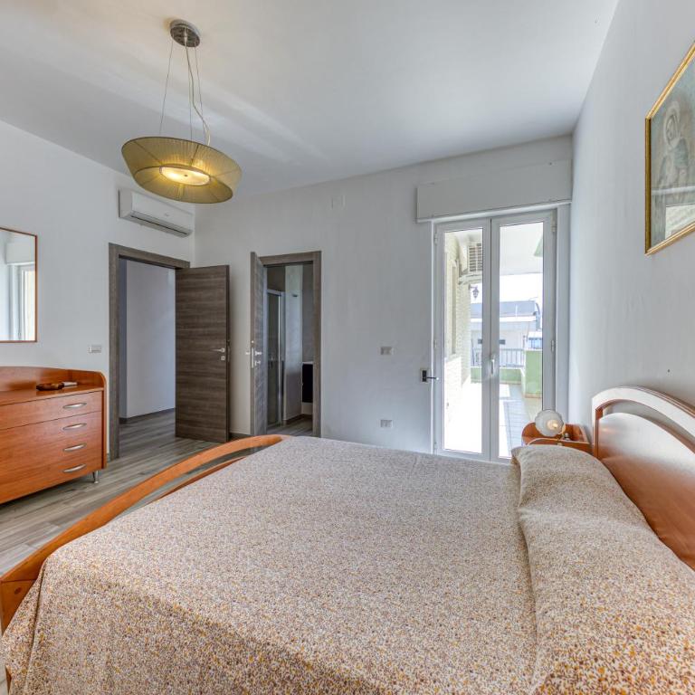 Casa Vacanze La Torre - Appartamento Premium con 3 Camere da Letto e Balcone - 7