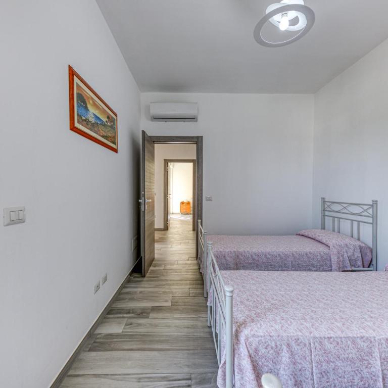 Casa Vacanze La Torre - Appartamento Premium con 3 Camere da Letto e Balcone - 14