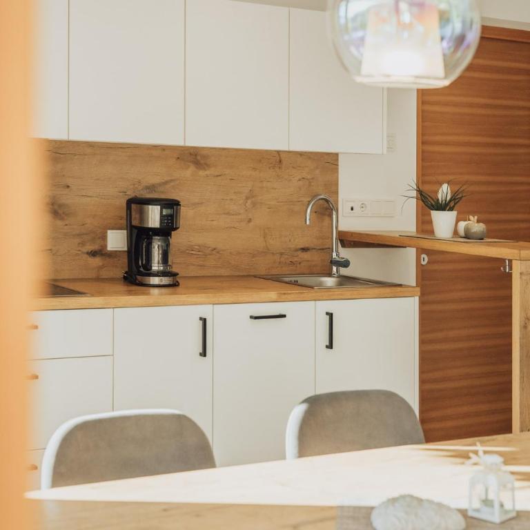 Oberegghof Ferienwohnung Garten - Appartamento Deluxe con 2 Camere da Letto e Vista Giardino - 17