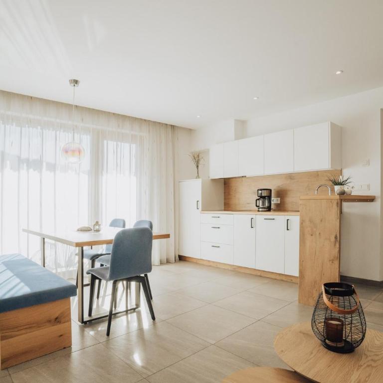 Oberegghof Ferienwohnung Garten - Appartamento Deluxe con 2 Camere da Letto e Vista Giardino - 12