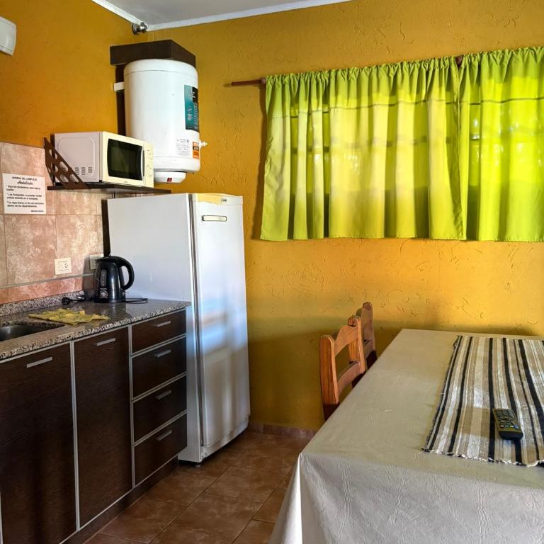Departamento familiar con pileta y cochera en Miramar - One-Bedroom Apartment with Garden - 15