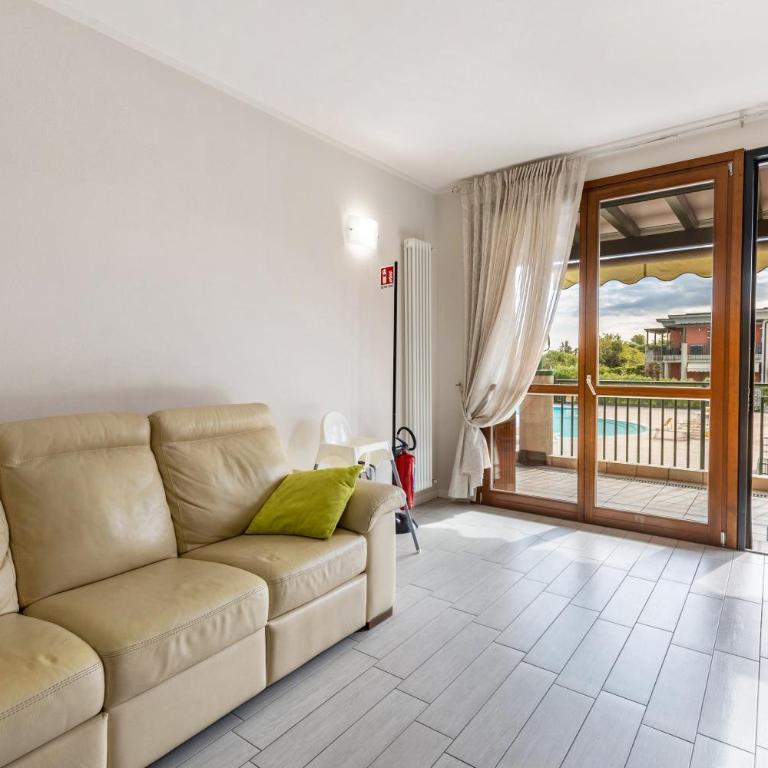 Delizioso Residence Vista Lago - Appartamento Deluxe con 2 Camere da Letto e Vista Giardino - 3