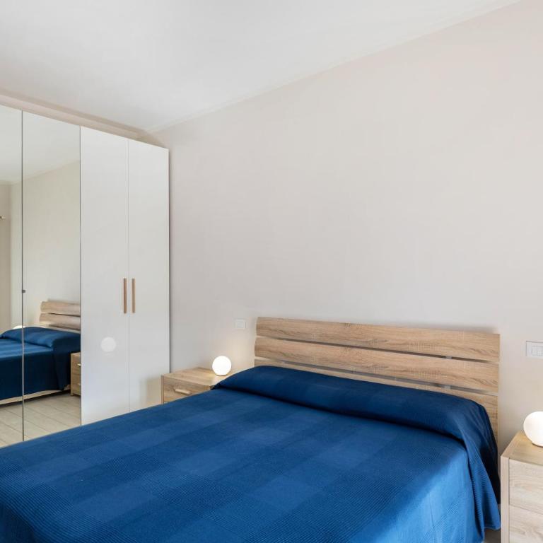 Delizioso Residence Vista Lago - Appartamento Deluxe con 2 Camere da Letto e Vista Giardino - 12