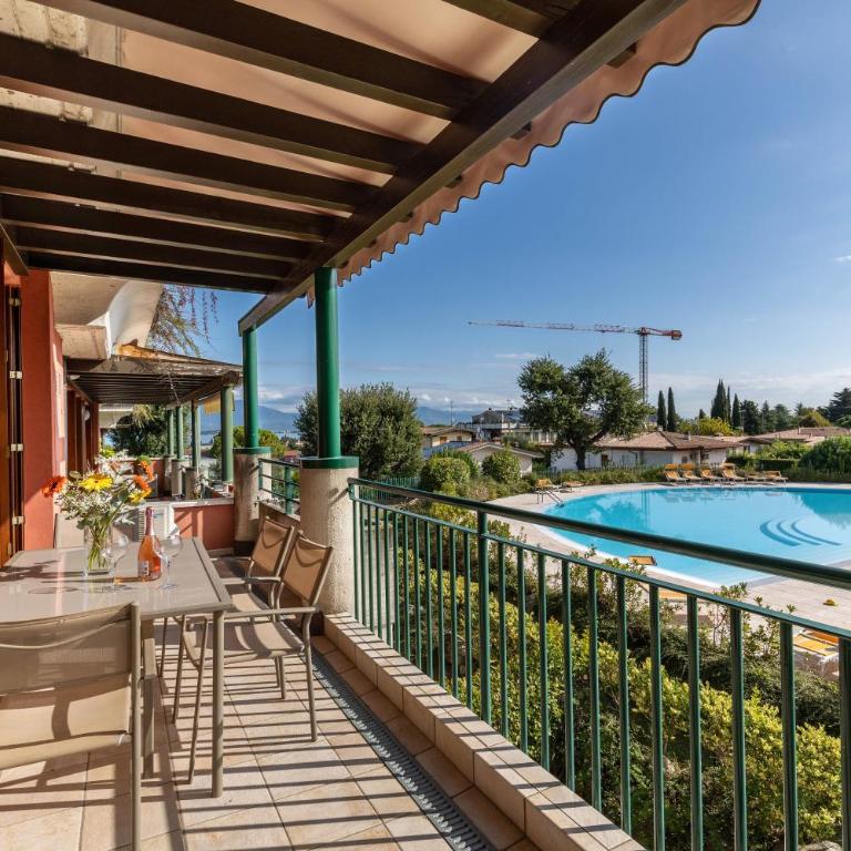 Delizioso Residence Vista Lago - Appartamento Deluxe con 2 Camere da Letto e Vista Giardino - 22