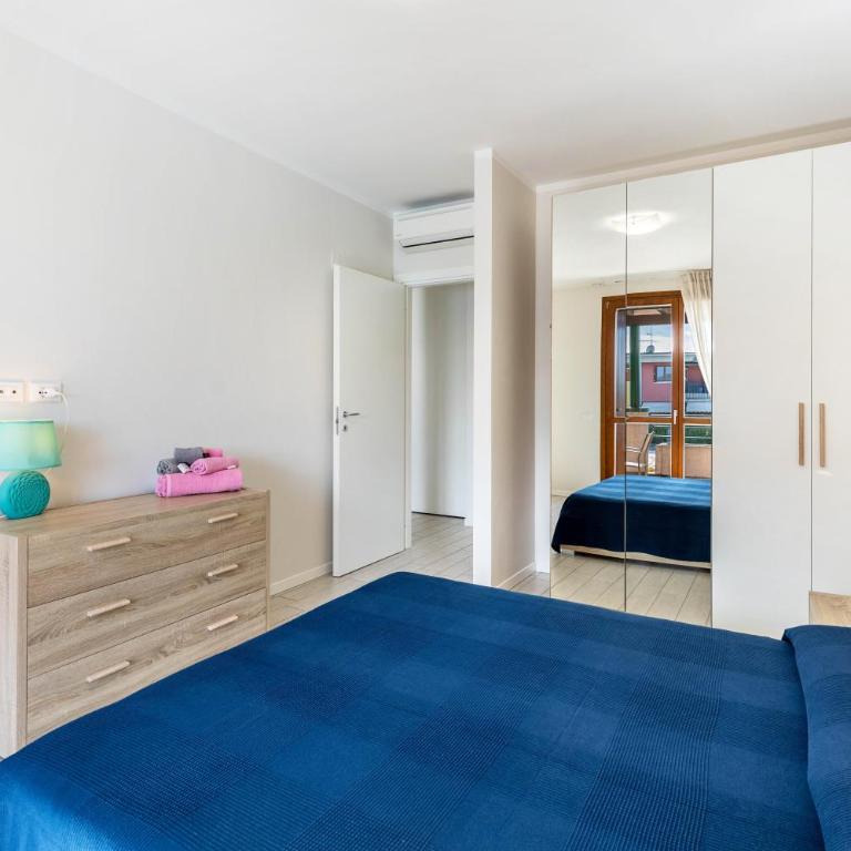 Delizioso Residence Vista Lago - Appartamento Deluxe con 2 Camere da Letto e Vista Giardino - 13