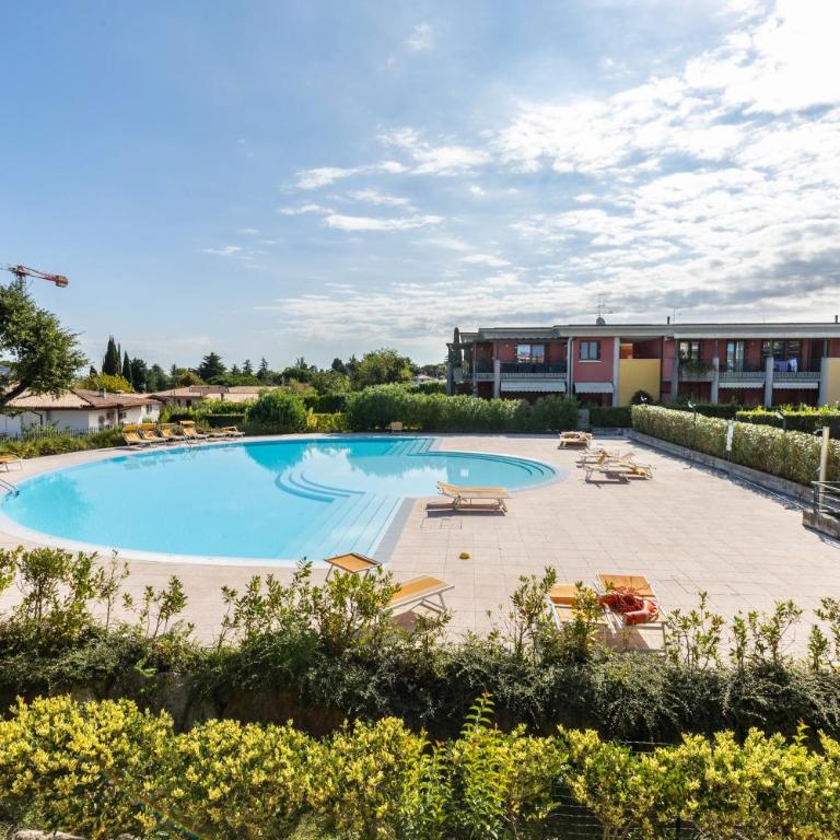 Delizioso Residence Vista Lago - Appartamento Deluxe con 2 Camere da Letto e Vista Giardino - 25