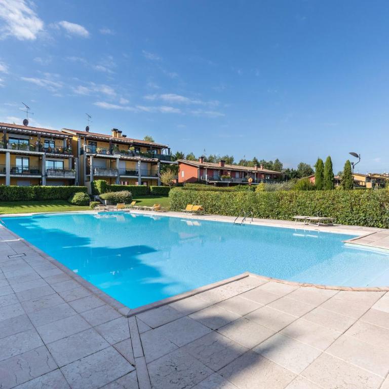 Delizioso Residence Vista Lago - Appartamento Deluxe con 2 Camere da Letto e Vista Giardino - 21