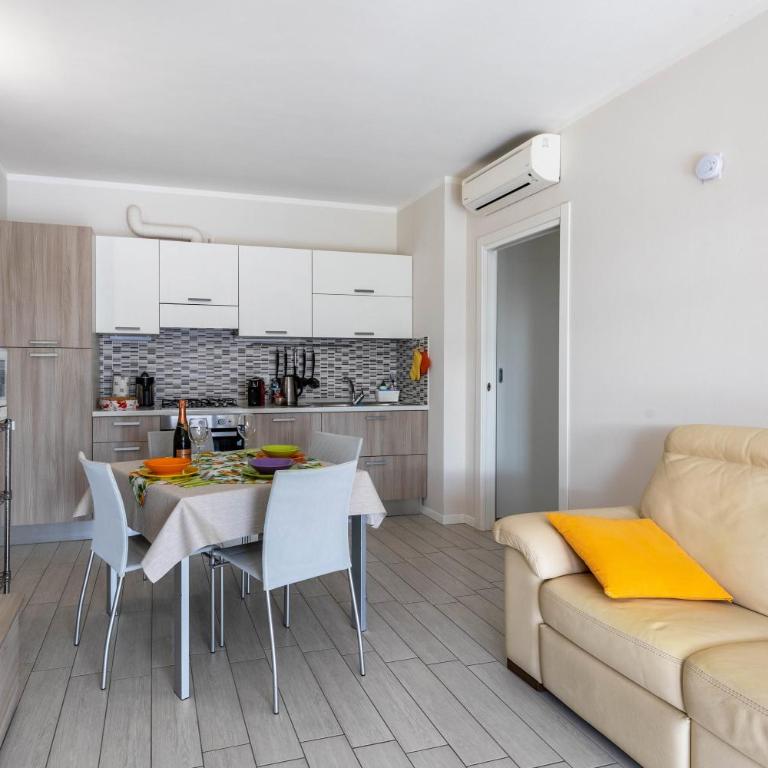 Delizioso Residence Vista Lago - Appartamento Deluxe con 2 Camere da Letto e Vista Giardino - 6