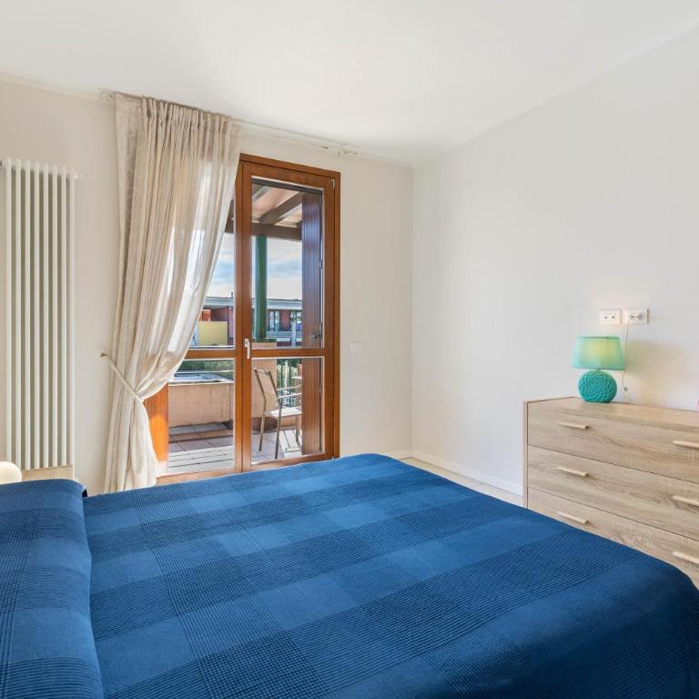Delizioso Residence Vista Lago - Appartamento Deluxe con 2 Camere da Letto e Vista Giardino - 10