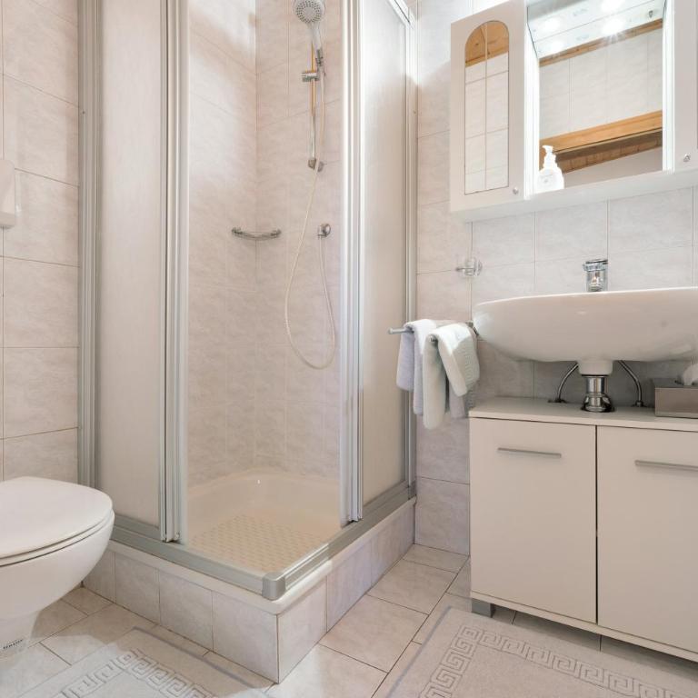Apartment Dolomitenblick - Appartamento Deluxe con 2 Camere da Letto e Vista Giardino - 11