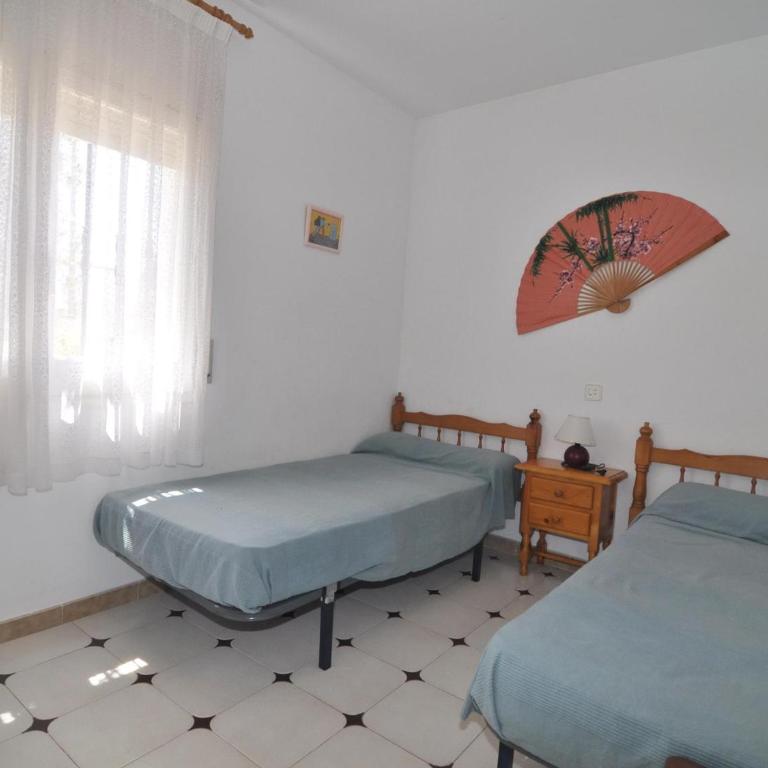 Casa en planta baja con jardín y piscina comunitaria en una zona tranquila de L'Escala - HISP-7-14 - Villa - 11