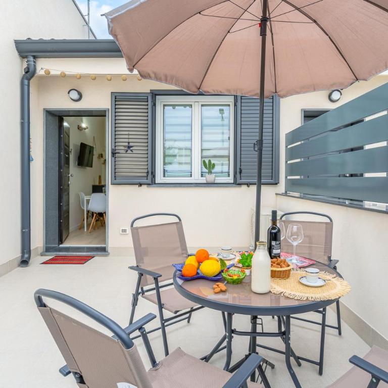 Benvenuti al Sud - Appartamento con 1 Camera da Letto e Vista Giardino - 1