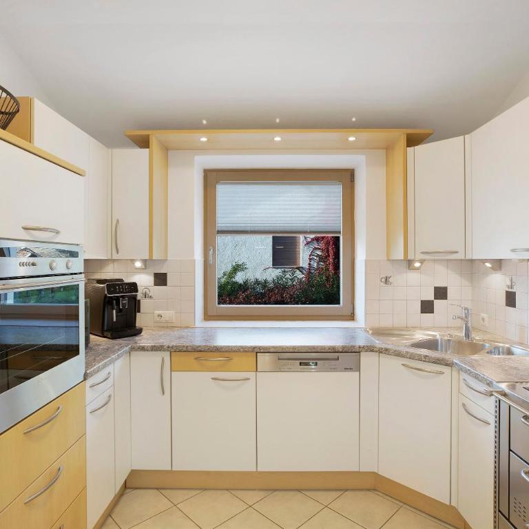 Apartment Sonnblick Kaltern - Appartamento Deluxe con 2 Camere da Letto e Vista Giardino - 12