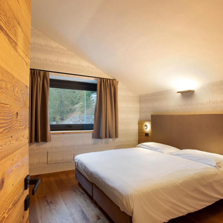 Valgrisa Mountain Lodges 1 - Appartamento Deluxe con 2 Camere da Letto e Vista Giardino - 13