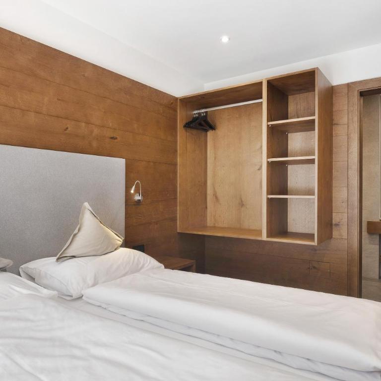 Apartments Montblanc Sella - Appartamento Deluxe con 2 Camere da Letto e Vista Giardino - 12