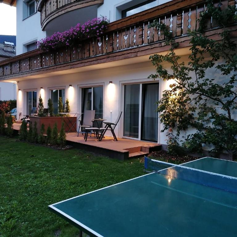 Apartments Montblanc Sella - Appartamento Deluxe con 2 Camere da Letto e Vista Giardino - 25