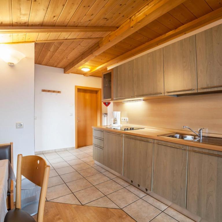Lingerhof Arnika - Deluxe-Apartment mit 2 Schlafzimmern und Gartenblick - 8