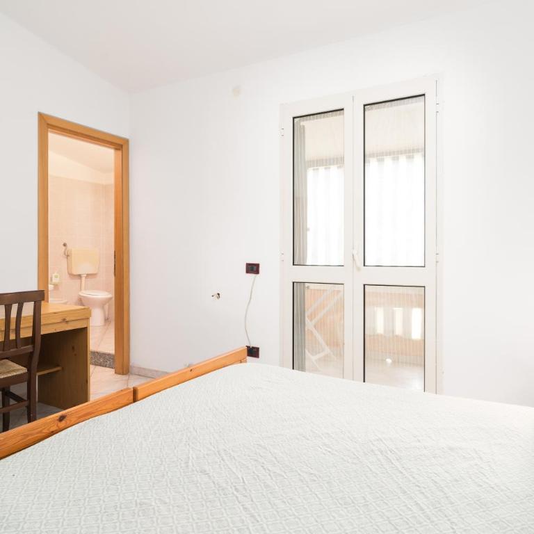 Casa nel centro di Budoni - Appartamento Premium con 3 Camere da Letto e Balcone - 6
