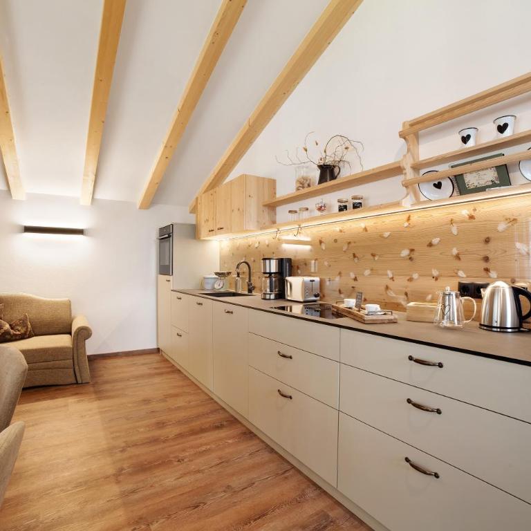 Apartments Feldbauer - Apartment mit 1 Schlafzimmer und Gartenblick - 11