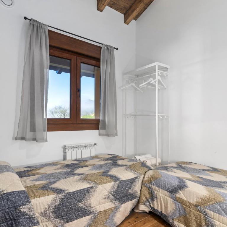 Picuastur - Apartamento Deluxe de 2 dormitorios con vistas al jardín - 12