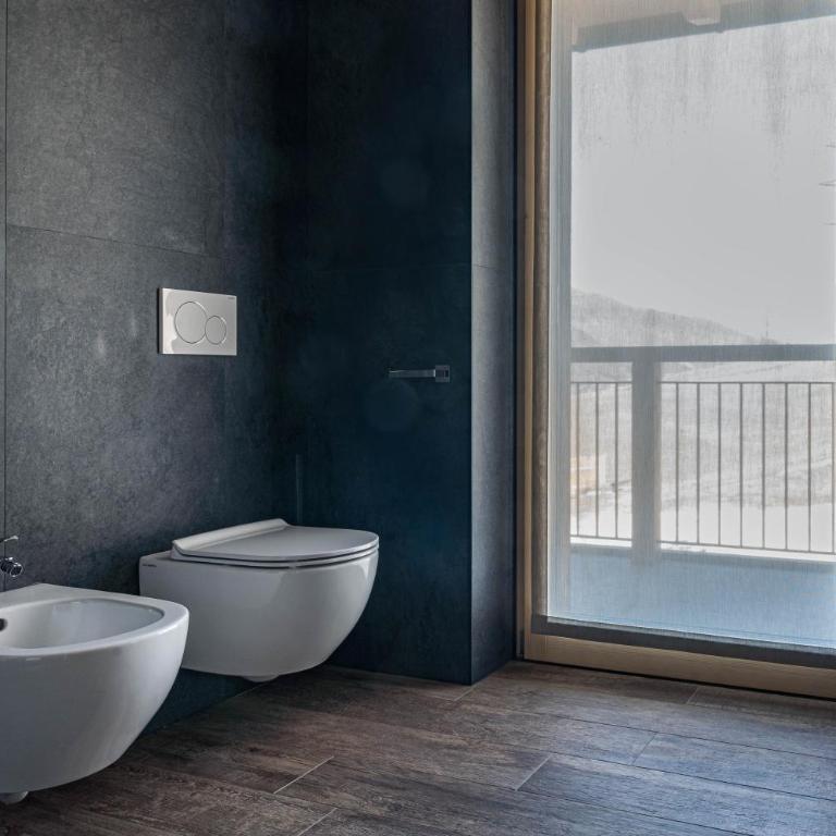 Arnica Alpin Lodge - Two-Bedroom Deluxe Apartment with Garden View - 9