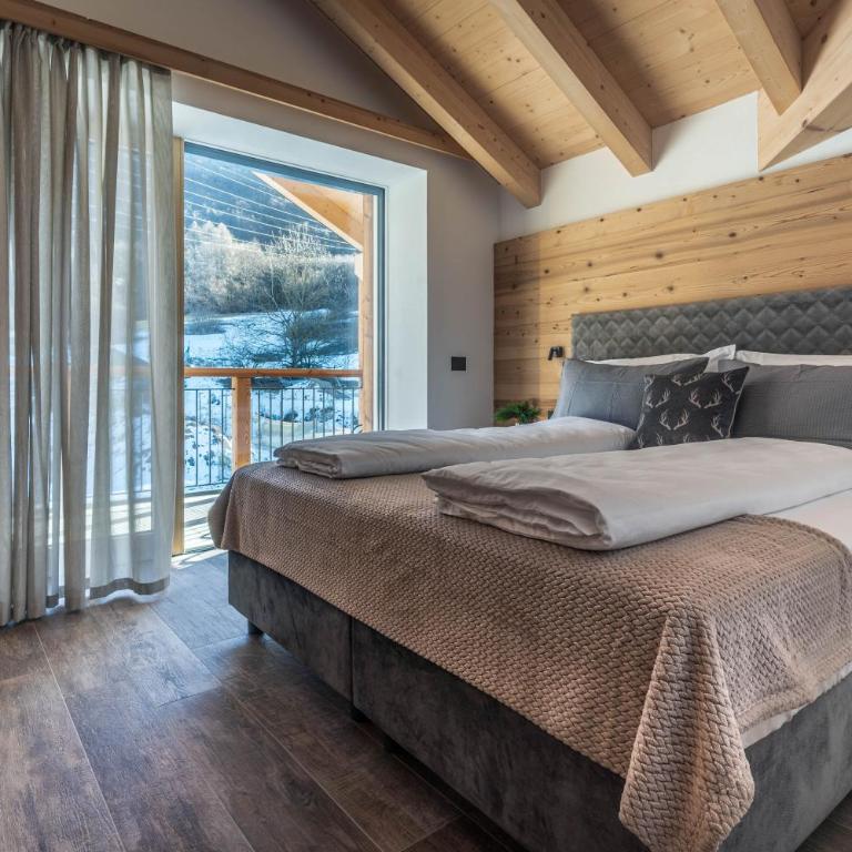 Arnica Alpin Lodge - Two-Bedroom Deluxe Apartment with Garden View - 3