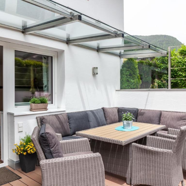 Haus Alpenheim Apartment 2 - Deluxe-Apartment mit 2 Schlafzimmern und Gartenblick - 1