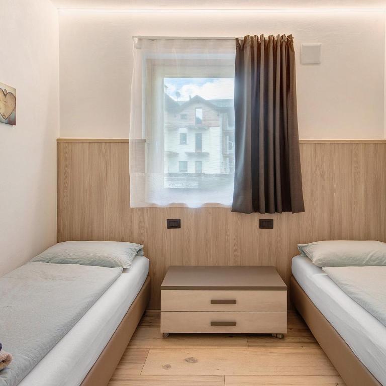 Chalet Snowlake Appartamento Lago - Appartamento Deluxe con 2 Camere da Letto e Vista Giardino - 12
