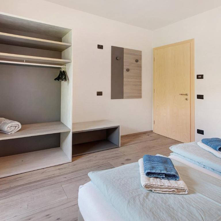 Chalet Snowlake Appartamento Lago - Appartamento Deluxe con 2 Camere da Letto e Vista Giardino - 11