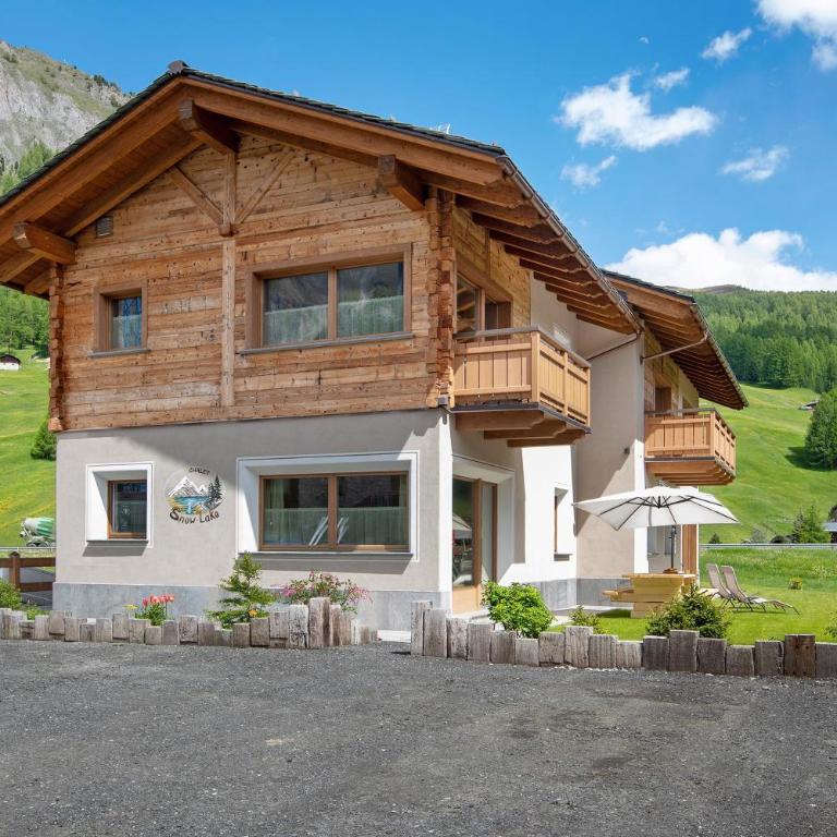 Chalet Snowlake Appartamento Lago - Appartamento Deluxe con 2 Camere da Letto e Vista Giardino - 21