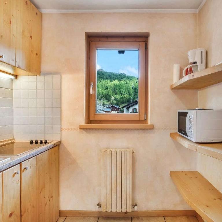 Baita dei ski app 4 - Appartamento Deluxe con 2 Camere da Letto e Vista Giardino - 10