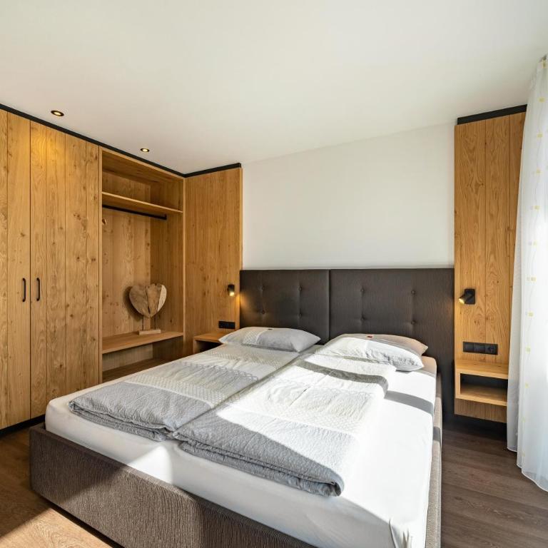 Sunnseitn Lodge Exclusive Panorama - Deluxe-Apartment mit 2 Schlafzimmern und Gartenblick - 10