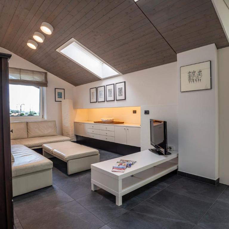 Tubris Living - Appartamento Deluxe con 2 Camere da Letto e Vista Giardino - 24
