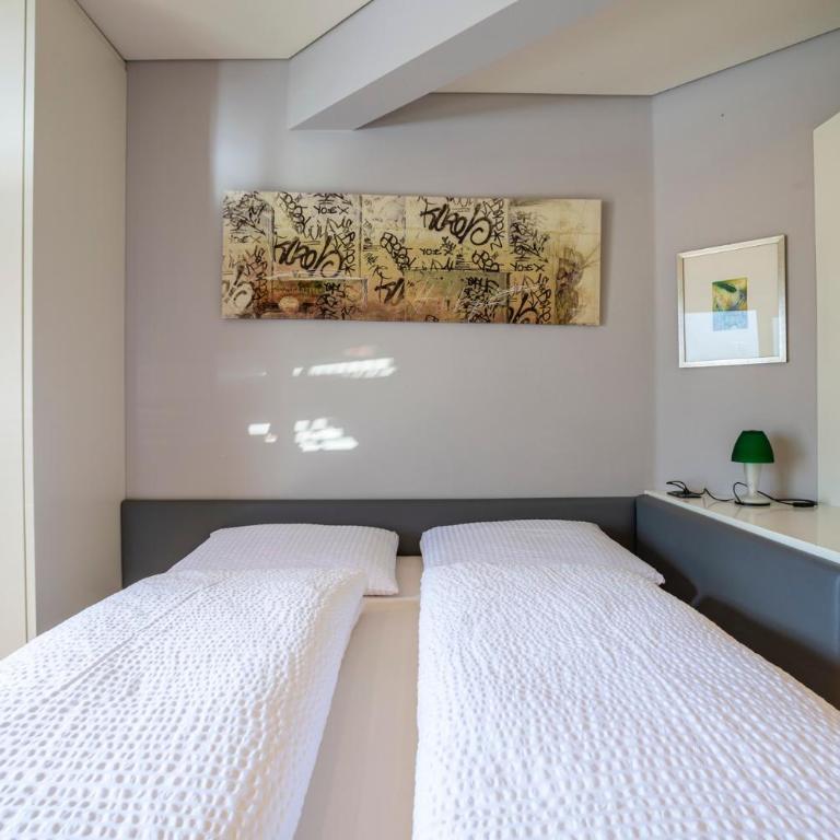 Tubris Living - Appartamento Deluxe con 2 Camere da Letto e Vista Giardino - 16