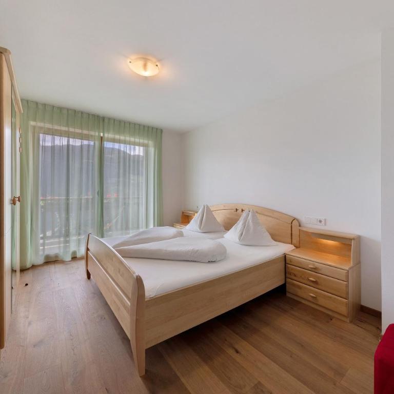 Obertrisaierhof Wohnung Deluxe 5 - Deluxe-Apartment mit 2 Schlafzimmern und Gartenblick - 4