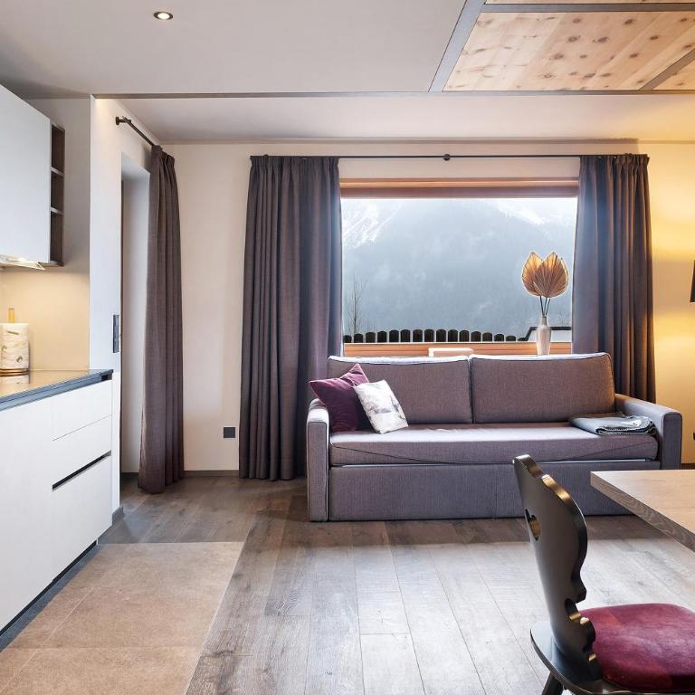 Angerle Alm Apt König Laurin - Appartamento Deluxe con 2 Camere da Letto e Vista Giardino - 1