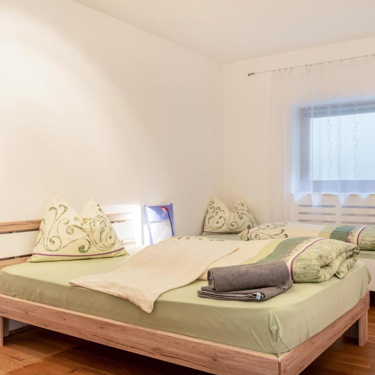 Apartement Santner - Appartamento Deluxe con 2 Camere da Letto e Vista Giardino - 13